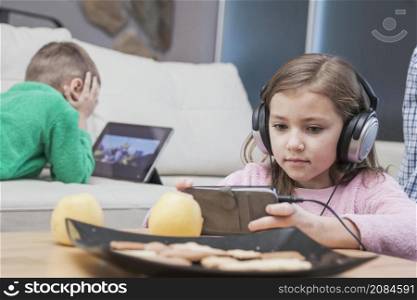 kids using technologies living room
