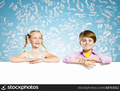 Kids with banner. Image of cute kids holding blank white banner. Place for text