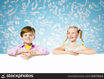 Kids with banner. Image of cute kids holding blank white banner. Place for text