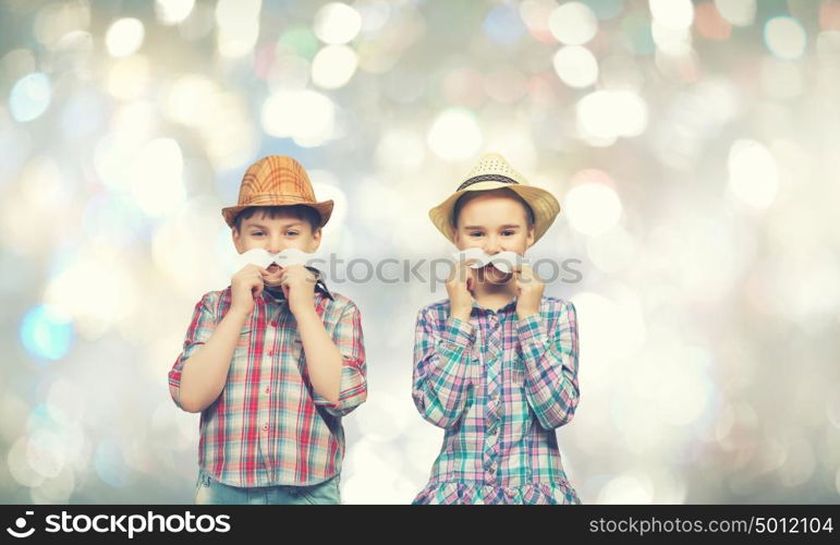 Kids with mustache. Cute girl and boy wearing shirt hat and mustache