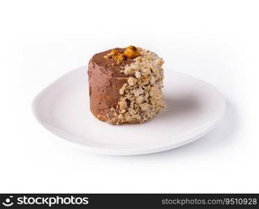 Kiev cake with walnuts on white plate