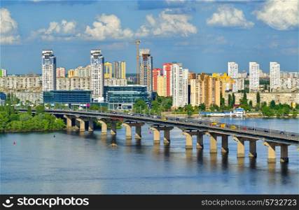 Kiev city, Capital of Ukraine. View of the Dnieper river, Paton bridge and new buildings in Kyiv