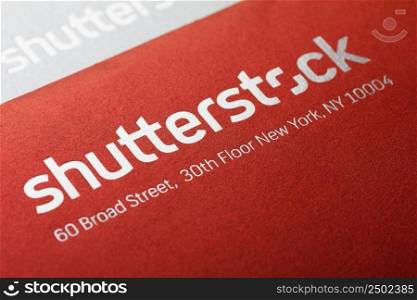 KIEV, UKRAINE - February 3  Large Shutterstock Corporation logo printed on a envelope and post card, in Kiev, Ukraine, on February 3, 2014. Shallow depth of field.