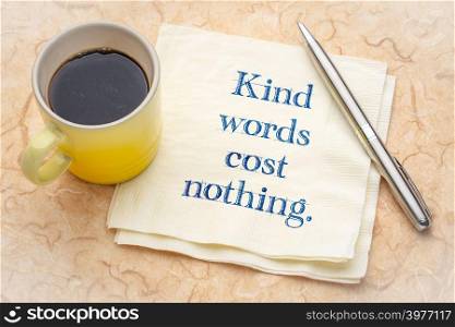 Kind words cost nothing - handwriting on a napkin with a cup of espresso coffee