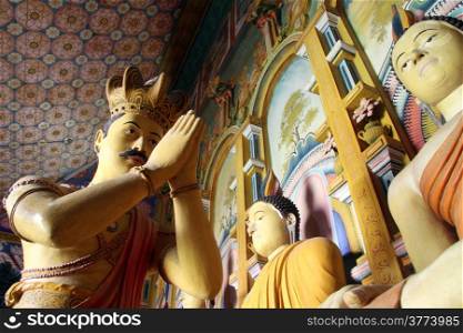 King and Buddha in Wewurukannala Vihara, Sri Lanka