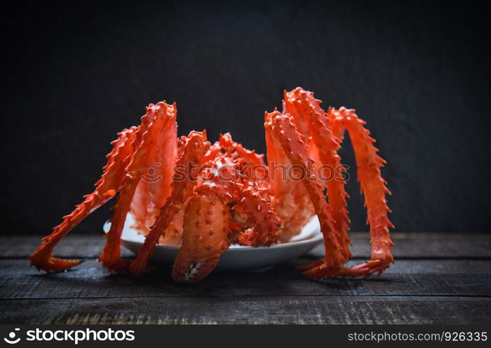 King Crab Cooked steamer food on plate seafood with dark background / red Alaskan crab hokkaido