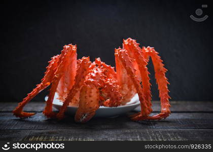 King Crab Cooked steamer food on plate seafood with dark background / red Alaskan crab hokkaido