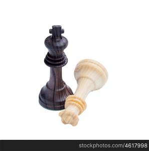 King defeating Queen. Wooden chess pieces on chessboard