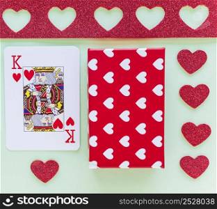 king hearts playing card with gift box table