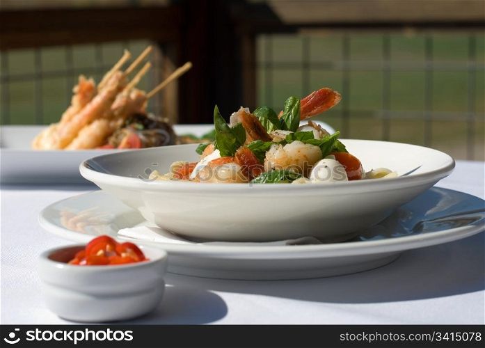 King Prawns, served with Roasted Cherry Tomatoes, Bocconcini, Freshly Slice Chilli, and Basil Leaves