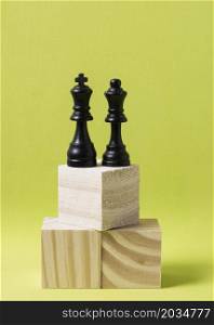 king queen pieces chess wooden cubes same height