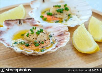 King scallop with roe and butter sauce in shell