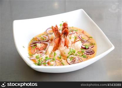 King shrimps with vegetables at cream sauce