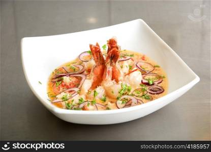 King shrimps with vegetables at cream sauce