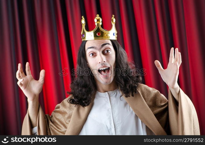 King with crown against background