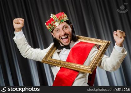 King with picture frame in funny concept