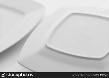 kitchen and restaurant utensils, plates, on a light background. kitchen and restaurant utensils, dishes