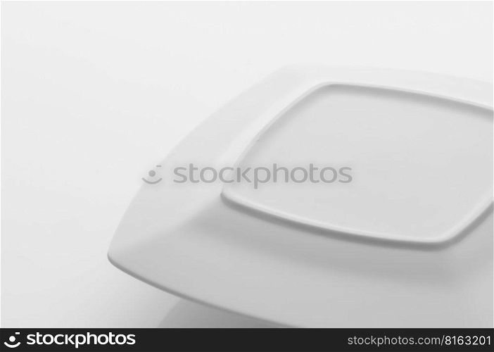 kitchen and restaurant utensils, plates, on a light background. kitchen and restaurant utensils, dishes