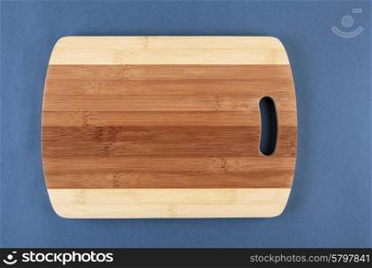 kitchen cutting board on a blue background