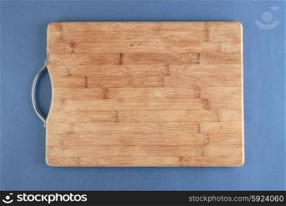 kitchen cutting board on a blue background