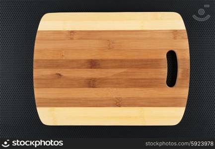 Kitchen cutting board on a metal table