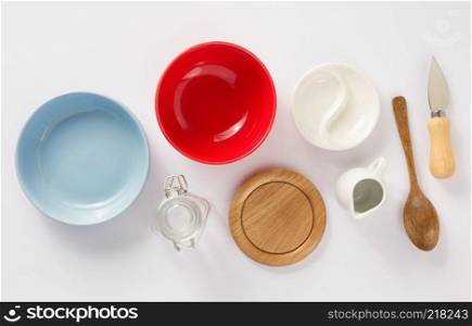 kitchenware set at white background, top view