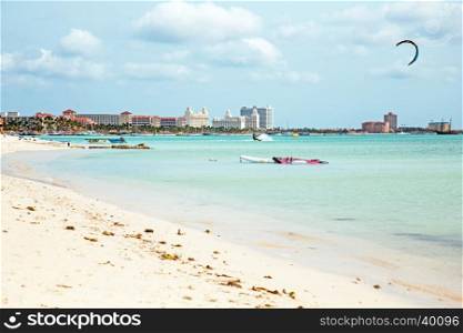 Kite surfing on Palm Beach on Aruba island in the Caribbean Sea