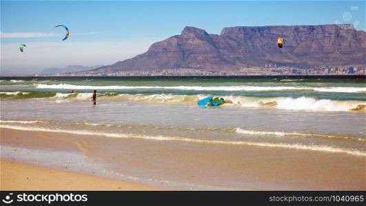 Kitesurfer at Bloubergstrand with a view of the Tafelberg