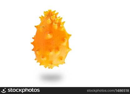 Kiwano or Horned Melon Cucumis metuliferus detailed skin shoot issolated on white background.. Fruit theme. Kiwano or Horned Melon Cucumis metuliferus detailed skin shoot issolated on white background.