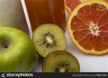 Kiwi, Apple and grapefruit on white background. The concept of diet, diet for weight loss.. Kiwi, Apple and grapefruit on white background.