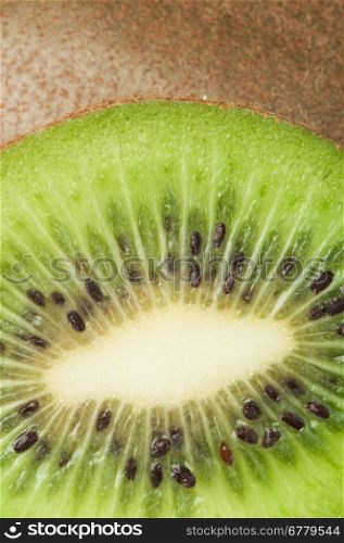 Kiwi fruit close up background. Cut kiwi fruit.