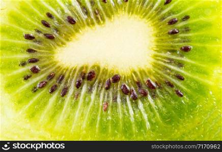 Kiwi fruit cut in half. Suitable as a Background