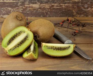 Kiwi Fruits, Close Up On Wooden Background