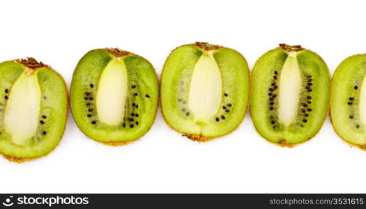 kiwi halves laying in row, white background