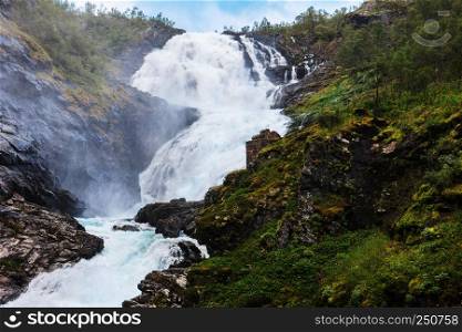 kjosfossen waterfall by the Flam to myrdal flamsbana railway line, Norway