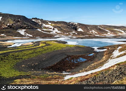 Kleifarvatn lake in winter in a sunny day near Krysuvik sulphuric area in Reykjanes peninsula, Iceland. Kleifarvatn lake in winter in a sunny day Iceland