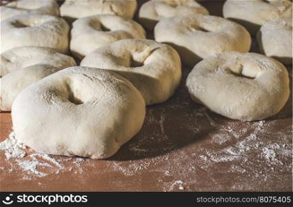 Kneading bagels close up