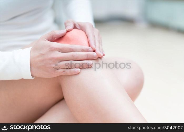 knee pain injury women sitting and touch her knee painful, healt. knee pain injury women sitting and touch her knee painful, healthcare and medicine concept