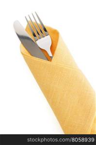 knife and fork at napkin isolated on white background
