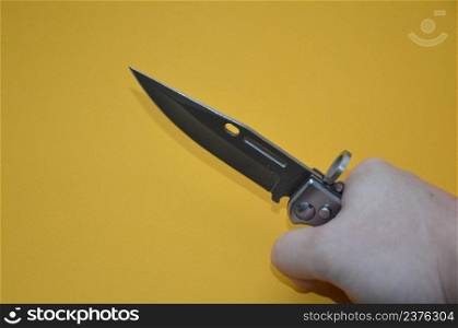 Knife as a cold piercing and cutting weapon for a self-defense