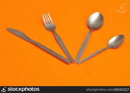Knife, fork, teaspoon and dessert spoon