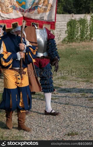 Knight and Squire with City Standard during Parade in Historical Event Reconstruction