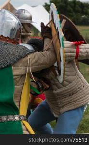 Knights in Battle with Silver Helmets and Shields: Medieval Event Reconstruction