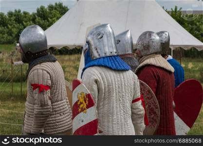 Knights with Silver Helmets and Armors in Line ready for Battle