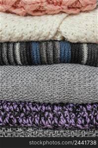 knitted clothes stacked close up