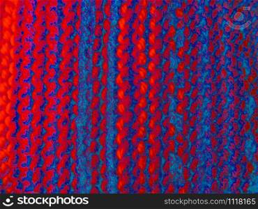 Knitted fabric texture. Background image. Hobbies, leisure, crafts. Vertical arrangement of the pattern. Acid colors. Knitting. Knitted fabric. Knitting texture. Background image. Hobbies leisure crafts. Acid colors