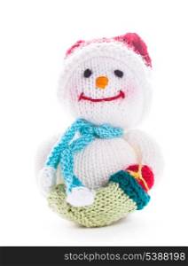 Knitted snowman with christmas santa boot isolated on white
