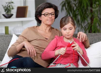 Knitting Grandmother and granddaughter