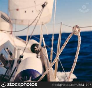 Knot on rope and sailboat crop in the sea&#xA;