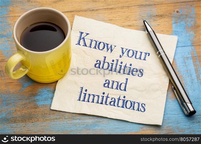 Know your abilities and limitations - handwriting on a napkin with a cup of espresso coffee